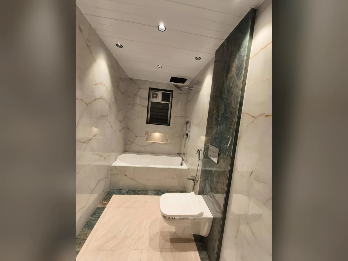 Bathroom – Marble Finish Renovation, completed project photograph by Royal Contractor