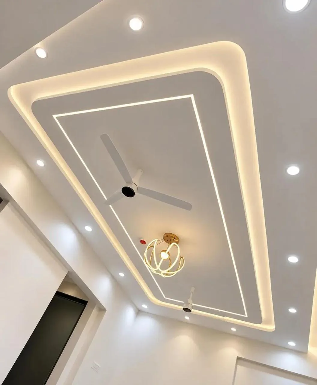 False ceiling with cove lighting, completed project photograph by Royal Contractor